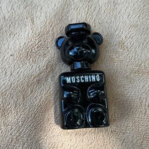 Tiny but full bottle Moschino black bear